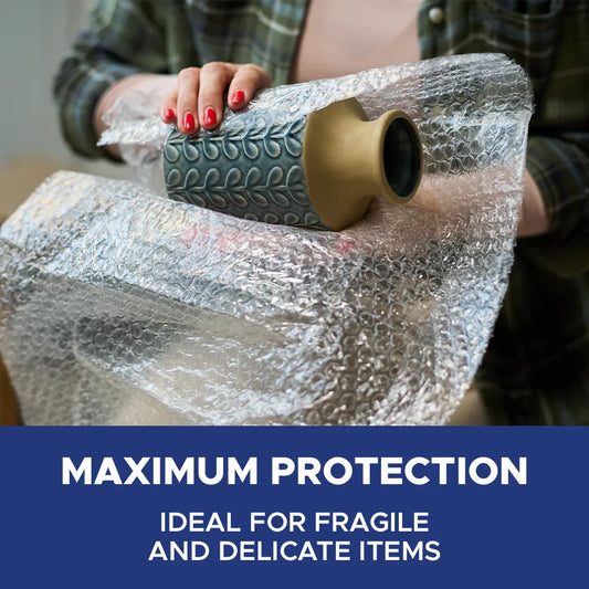 Hands wrapping a ceramic vase with bubble film for maximum protection, MEGA USA packaging supply