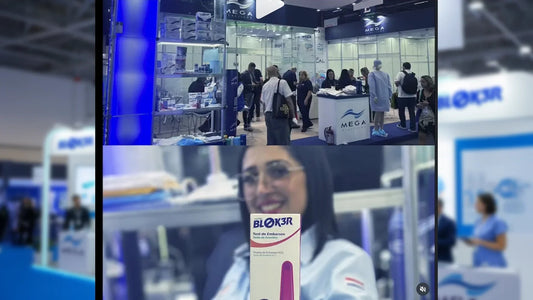MEGA USA trade show booth with hospital disposable products display, staff and visitors interacting